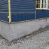 Application de crépi acrylique sur blocs de béton avant/après